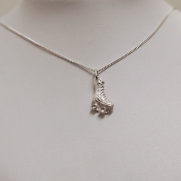 Imagen de Dije Patín